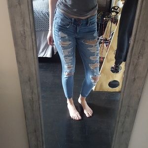 AE destroyed skinny ankle jeans